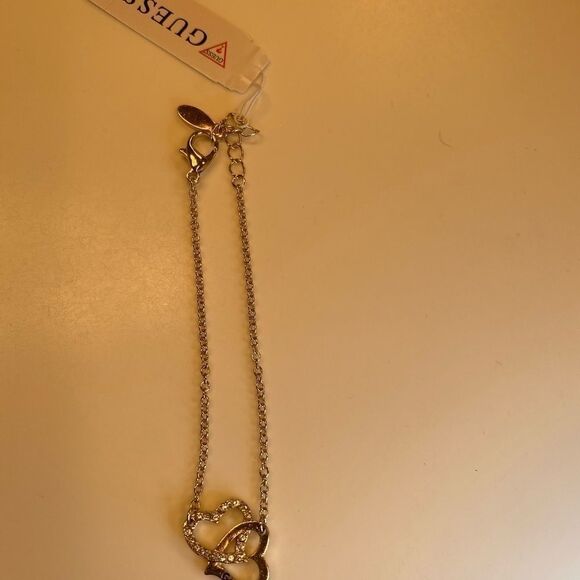 Guess Gold & Rhinestone Interlocking Hearts Bracelet - Picture 6 of 7